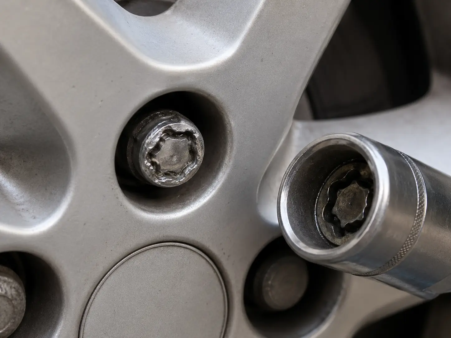 "damaged locking wheel nut after failed diy removal with socket on alloy wheel